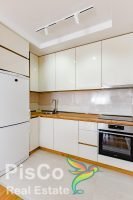 Apartment in a new building, warm tones and quality furniture