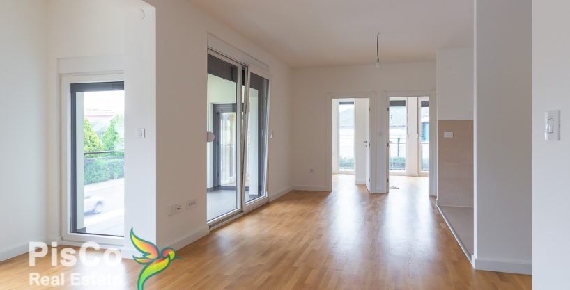 Nov dvosoban stan + garažno mjesto u zgradi Lux Residence u Tološima 